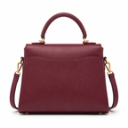 Bolso ORNISHOP con asa superior y correa ajustable.
