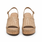 Sandalias de cuña de cuero tejido beige vista frontal