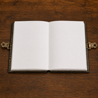 Cuaderno Místico Elefante Sagrado con Detalles Dorados y Piedra Azul Celestial