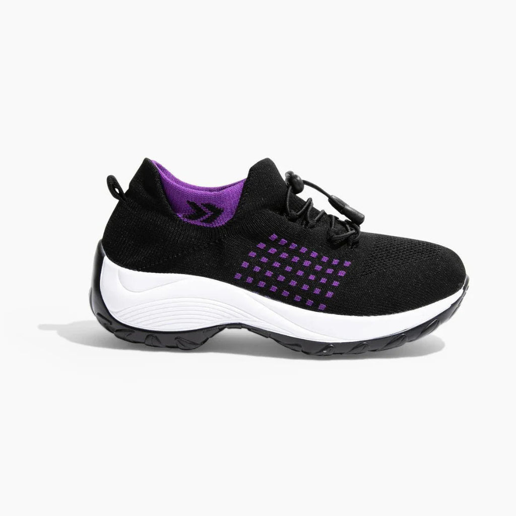 Zapatillas Orthofit en negro-morado con soporte para mejorar la circulación sanguínea.