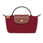 Vista completa del bolso Mini Élan de Longchamp con correa de hombro ajustable incluida.