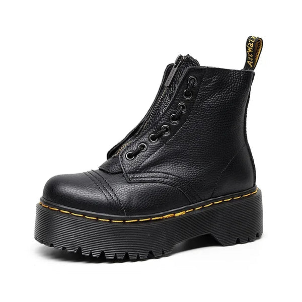 Botines de piel auténtica con plataforma gruesa para mujer en color negro, vista frontal.