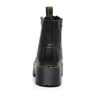 Botines negros de piel genuina con plataforma, vista trasera del diseño.