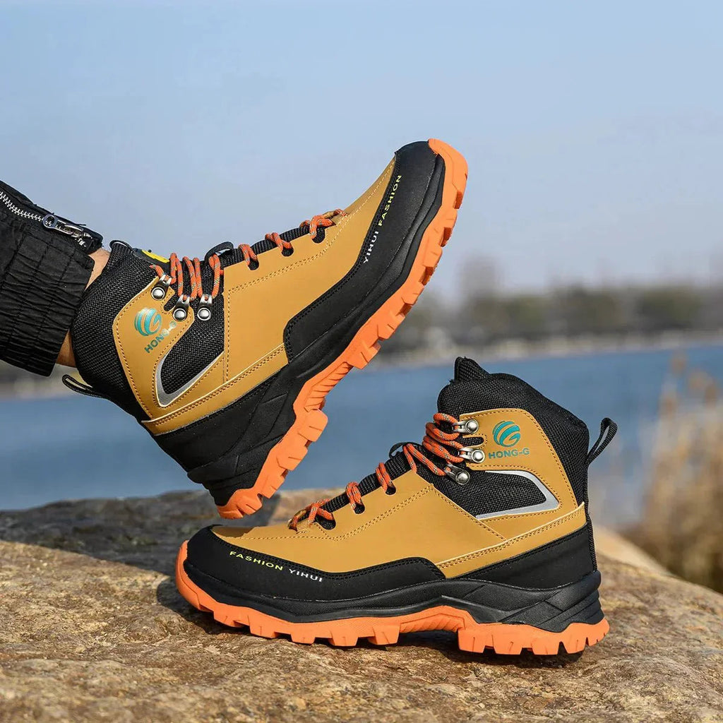 Vista lateral de botas laborales ORNISHOP HONG-G resistentes al desgaste para otoño e invierno
