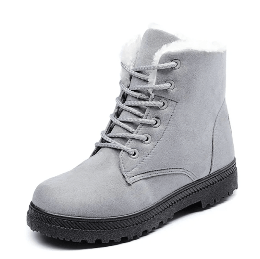 Pareja de botines WinterPlus exhibiendo su perfil estilizado y sistema de acolchado