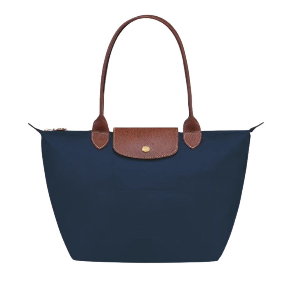 Bolso Longchanp Le Pliage en color blanco nieve sobre fondo neutro