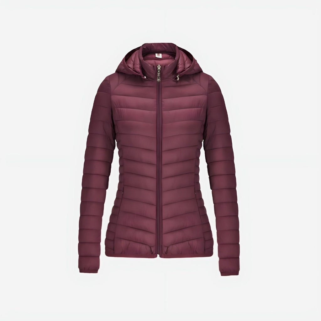 Chaqueta acolchada ultraligera ORNISHOP plegada, mostrando su formato compacto y peso pluma