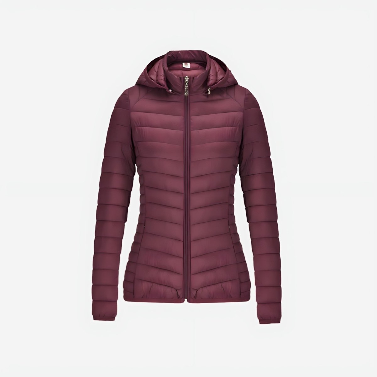 Chaqueta acolchada ultraligera ORNISHOP plegada, mostrando su formato compacto y peso pluma