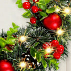 Corona de Navidad Lunoria con iluminación LED y bayas rojas