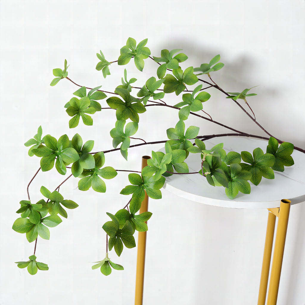 Planta verde decorativa artificial