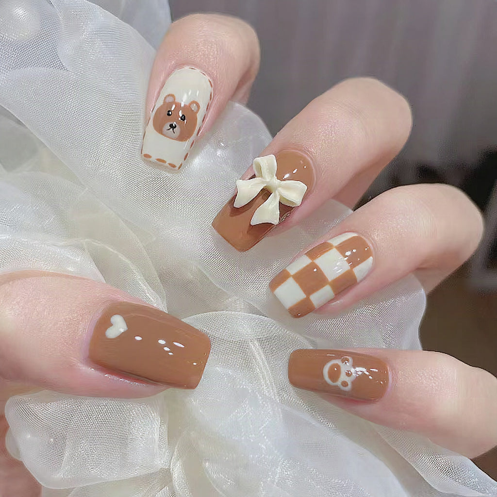 Uñas postizas artísticas con diseño de osito y lazos