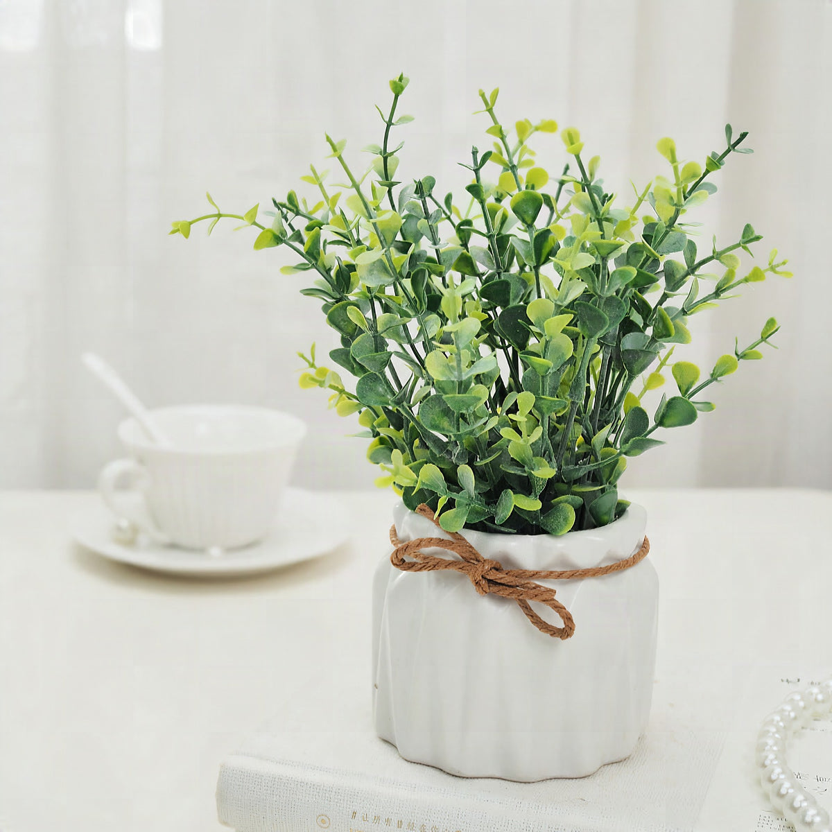 Planta artificial decorativa con maceta
