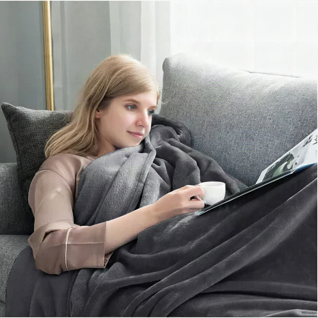 Manta impermeable CozyGuard – reversible, antimanchas y suave diseño de felpa