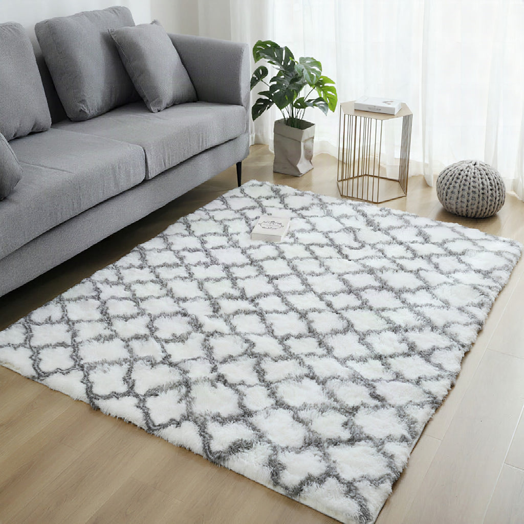 Alfombra de pelo largo con diseño geométrico
