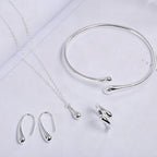 Conjunto de joyería de cuatro piezas