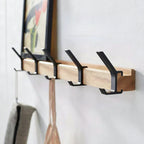 Perchero de pared con ganchos giratorios – Diseño escandinavo en madera y metal