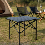 Mesa plegable de exterior con superficie resistente al calor y a los arañazos