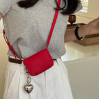 Mini bolso bandolera tipo clutch