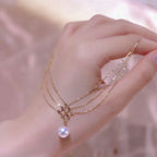Collar de perlas de agua dulce con baño de oro 24k
