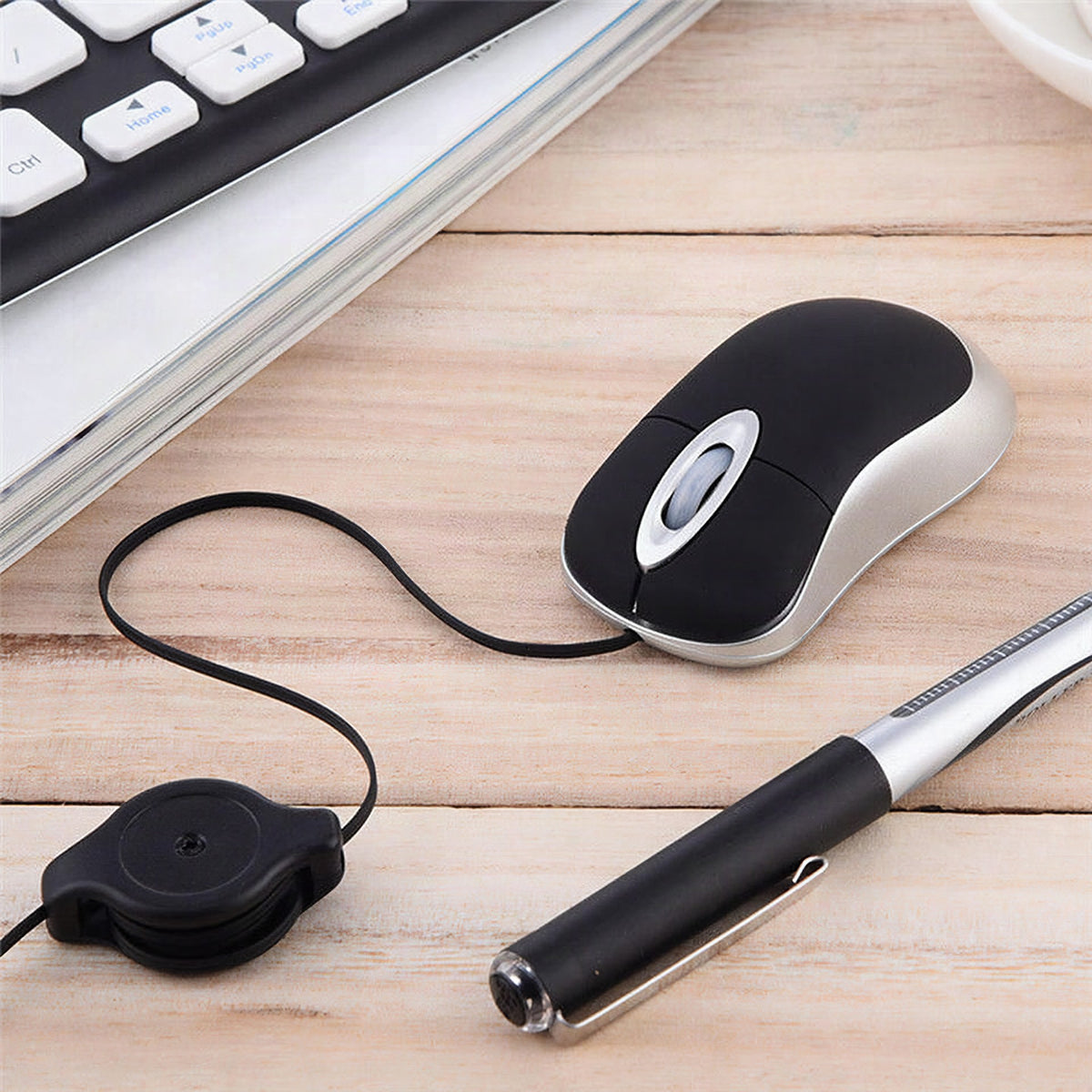 Ratón USB portátil con cable retráctil