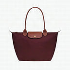 Bolso Longchanp Le Pliage en nylon y piel, vista frontal completa