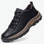 Botas ortopédicas de piel auténtica para hombre en color negro, vista frontal