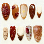 Set de uñas postizas con flores elegantes y brillos