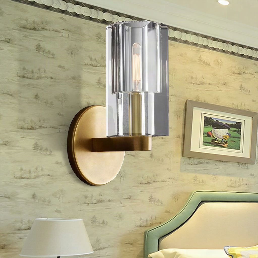 Aplique de pared modernista con cilindro de cristal transparente y placa redonda en latón