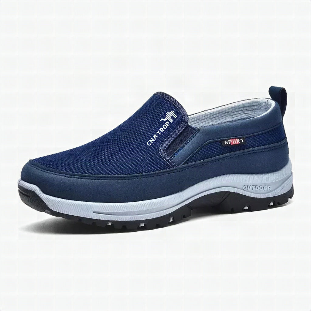 Zapatillas ortopédicas OrthoPro anatómicas sin cordones en color azul, vista frontal