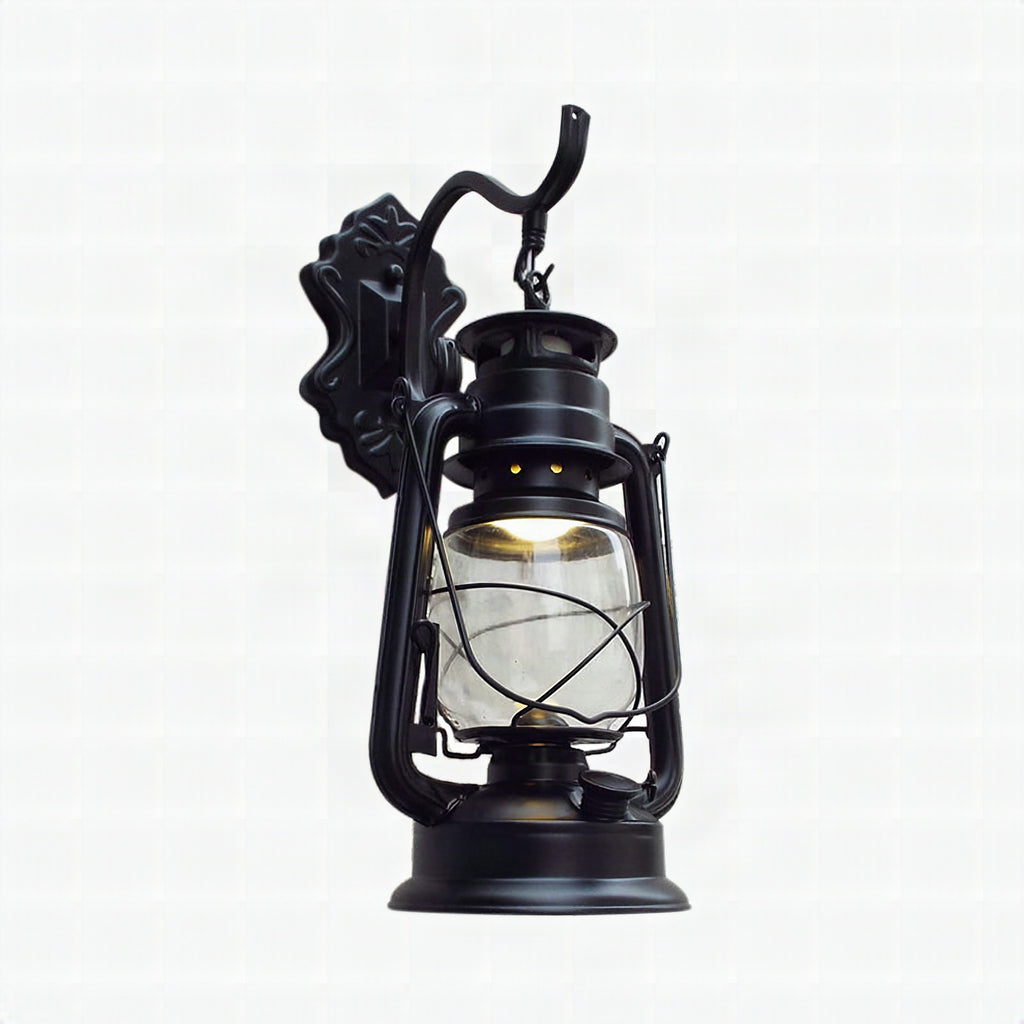 Aplique de pared estilo farol con cristal transparente, 1 luz, acabado negro o latón envejecido