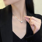 Collar con colgante de corazón magnético