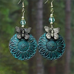 Pendientes elegantes con motivo floral y mariposas