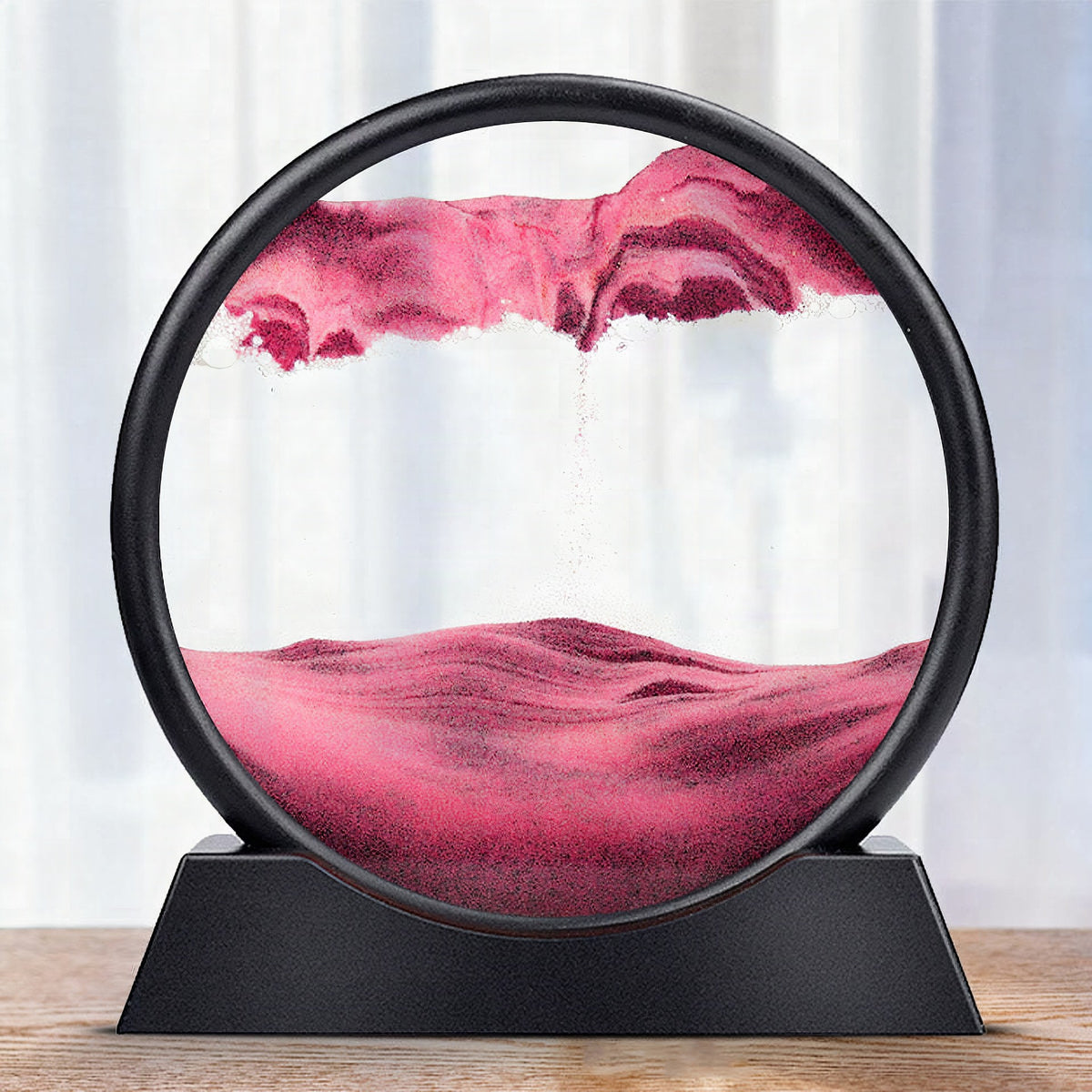 Reloj de arena decorativo con paisajes de arena en movimiento