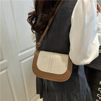 Bolso clutch estructurado con bandolera
