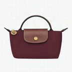 Bolso Mini Élan de Longchamp para mujer, vista frontal con cierre de cremallera y herrajes dorados.
