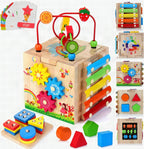 Niño jugando con el cubo Montessori MINDBLOX mostrando las distintas caras de actividades didácticas