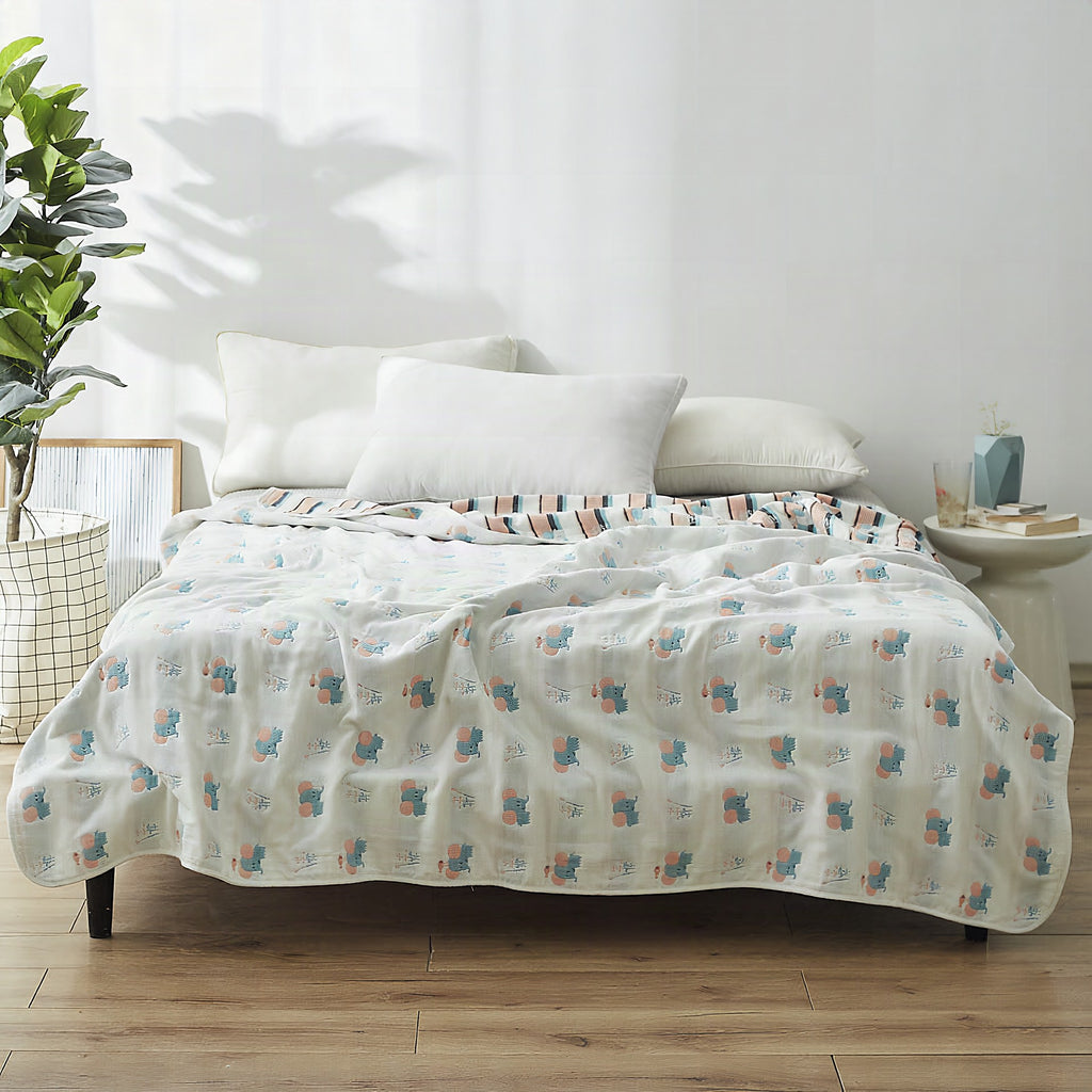 Manta elegante con sutil estampado de hojas