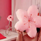 Cojín redondo con flores de cerezo coloridas
