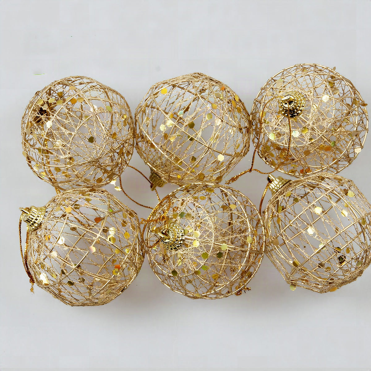 Bola de Navidad escamada con polvo dorado