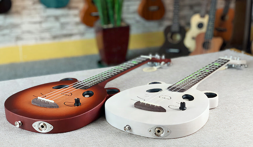 Ukelele eléctrico con diseño de osito