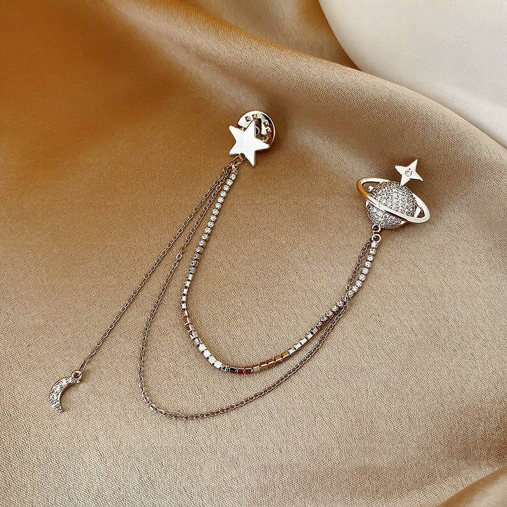 Pendientes de estrella y planeta con cadenas