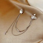 Pendientes de estrella y planeta con cadenas
