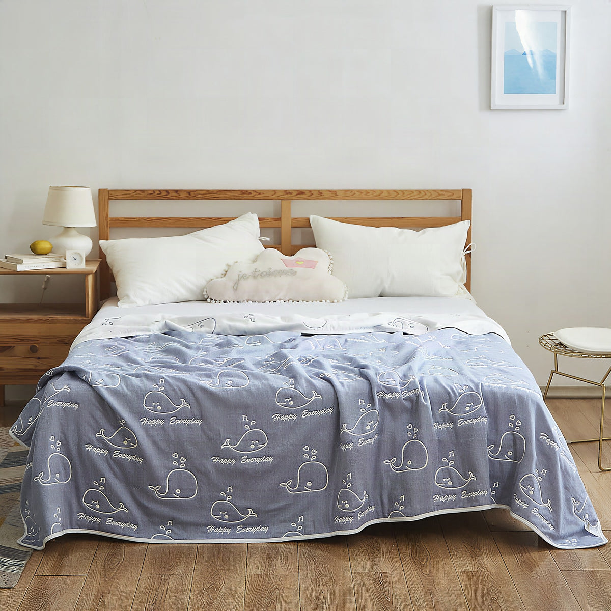 Manta elegante con sutil estampado de hojas