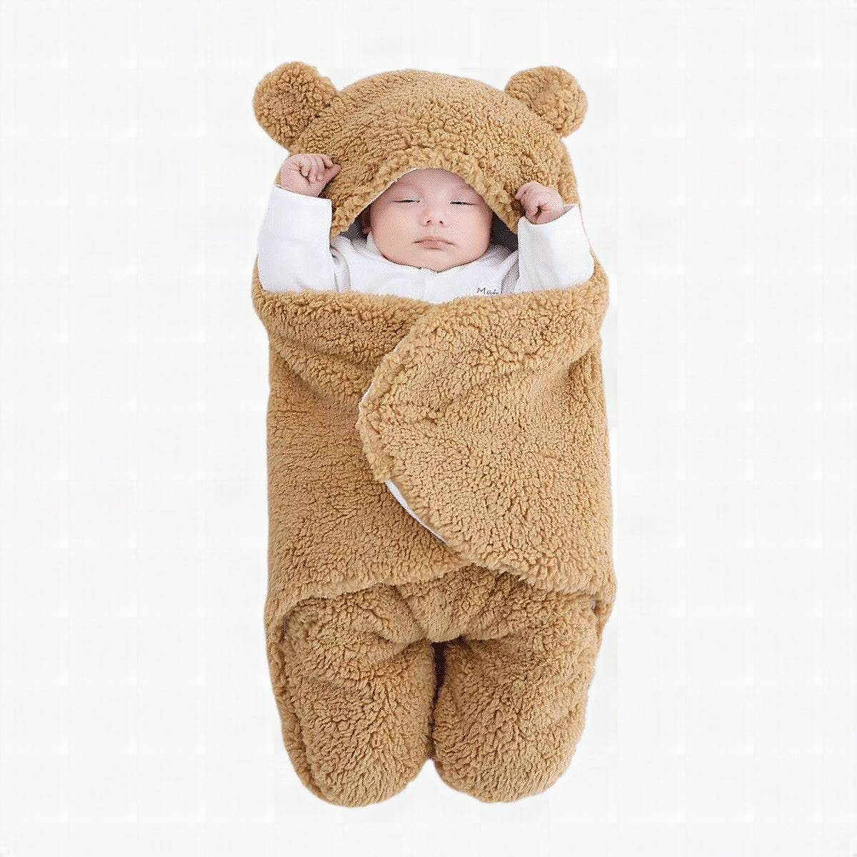 Bebé abrigado en saco de dormir ORNISHOP con diseño de osito