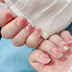 Uñas postizas de gel con diseños florales delicados