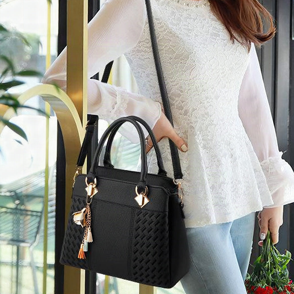Bolso elegante para mujer con colgante de borla