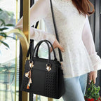 Bolso elegante para mujer con colgante de borla