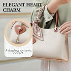 Bolso de mujer elegante con colgante de corazón brillante