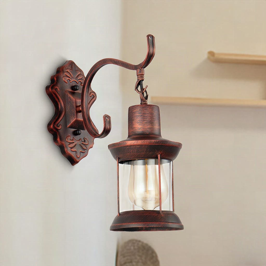 Aplique de pared estilo rústico con cristal transparente y acabado cobre envejecido