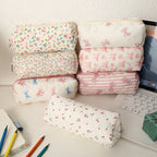 Estuche acolchado con estampado de lazos